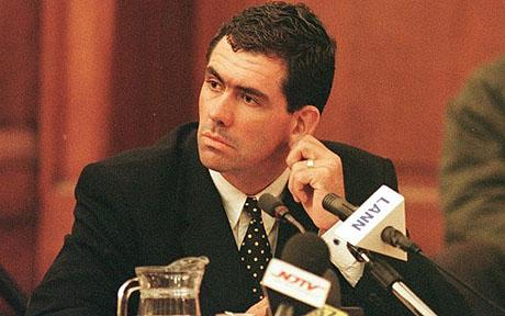 SAFRICA-CRICKET...CPT03 - 20000621 - CAPE TOWN, SOUTH AFRICA : Former South African cricket captain Hansie Cronje tugs his ear during cross-examination at the King Commission of Inquiry into allegations of cricket match-fixing in Cape Town 21 June 2000. EPA PHOTO AFP/ANNA ZIEMINSKI/AZ
